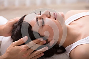 Woman Receiving Head Massage