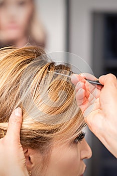 Woman receiving her hair done
