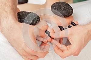 Woman receiving hot stone massage