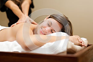 Woman receiving a massage in a spa