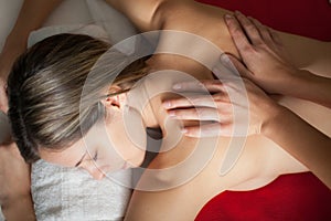 Woman receiving a massage in a spa