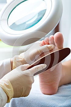 Woman receiving podiatry treatment in Day Spa photo