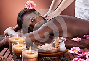 Woman Receiving Shoulder Massage At Spa