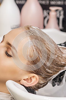 Woman receiving wash her hair