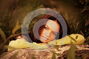 Woman recline on tree photo