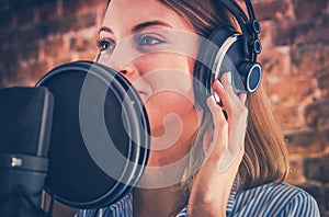 Woman Recording Audiobook photo