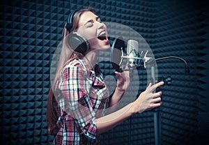 Woman in a recording studio photo