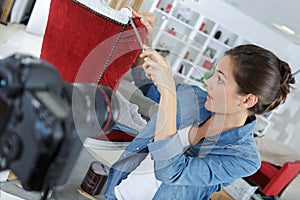 Woman recording upholstering workshop
