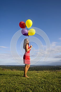 Woman in Red with Balloons