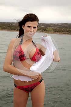 Woman in red bikini with white sarong