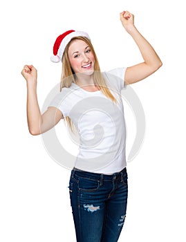 Woman with red christmas hat raised hand up