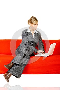 Woman on red couch