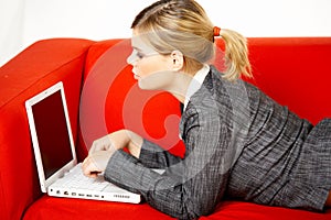 Woman on red couch