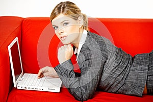 Woman on red couch