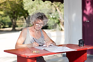 Woman at red desk