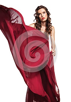 Woman in red dress with curly hair