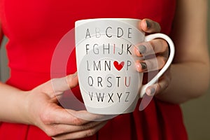 Woman in red dress holding coffee mug, I love You, Valentines day cup