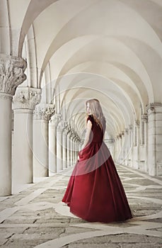 Woman in red dress near San Marco Square Venice photo