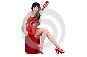 Woman in red dress playing guitar isolated