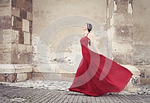 Woman in red dress walking