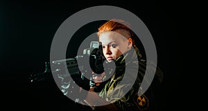 Woman with red hair and with a bandage on his face, hold machinegun in military uniform.