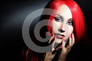 Woman in red hair wig portrait