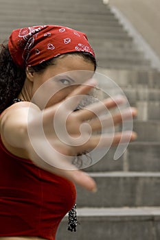 Woman in red hides her face