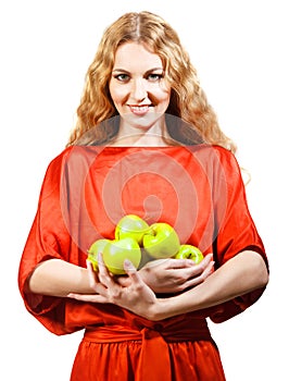 Woman in red holding apples in her hands