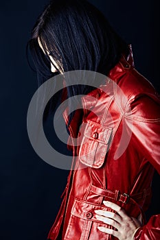 Woman in red leather jacket