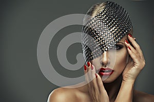woman with red lips and metal decor