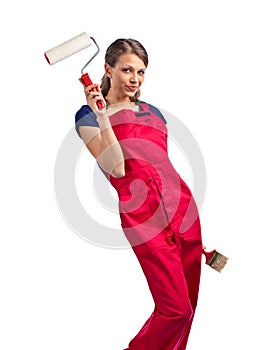 Woman in red overalls with painting tools