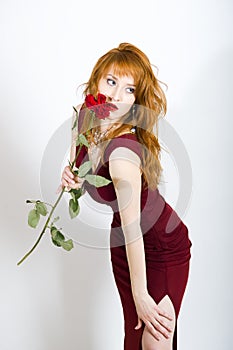 woman with red rose on valentines day