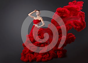 Woman in Red Ruching Dress, Fashion Model in Cloud Gown with Long Waving Flying Tail