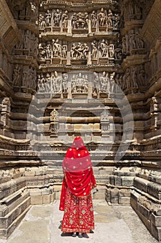 Woman in red sari, Khajuraho.