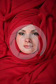 Woman in red scarf