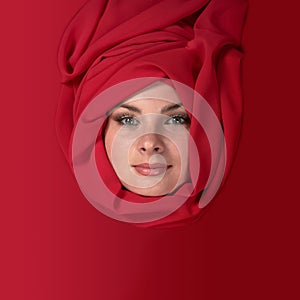 Woman in red scarf