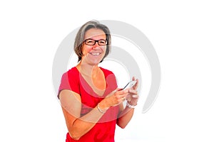 Woman in red t shirt on smartphone in studio