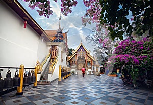 Woman with red umbrella in Thailand