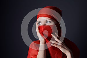 Woman in red veil photo