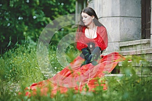 Woman in red Victorian dress photo