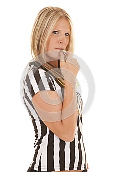 Woman referee blow whistle side