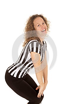 Woman referee squat smile