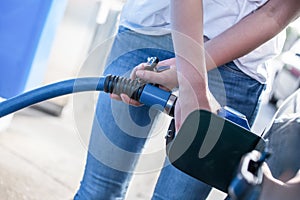 Woman refueling gasolin