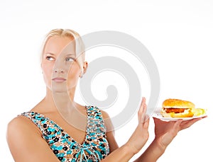 Woman refusing to eat unhealthy food