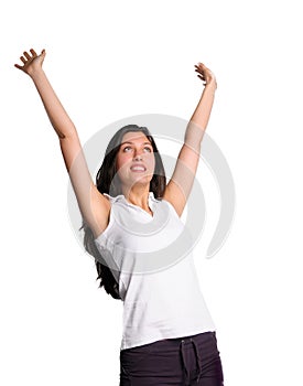 Woman rejoices with arms in air