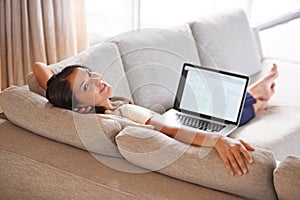 Woman, relax and laptop screen for remote work, sofa and lounge to connect to wifi and portrait smile. Female person