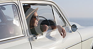 Woman, relax and road trip for summer vacation, explore or sightseeing in travel with car at the beach. Happy stylish