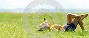 Woman relax and sleep chill  in the meadow  outdoor near sea beach