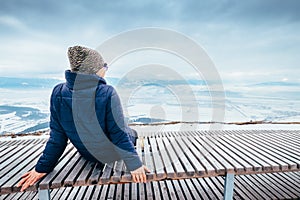 Woman relax on top hill point with beautiful panorame view on wi