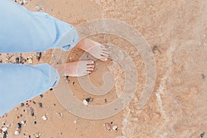 Woman In Relaxation On Tropical Beach with sand